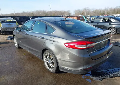 2017 Ford Fusion Hybrid Se z USA, uszkodzony, nr VIN 3FA6P0LU2HR344130